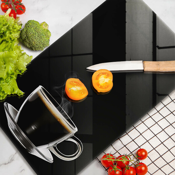 Tábua para cozinha Um copo de café quente