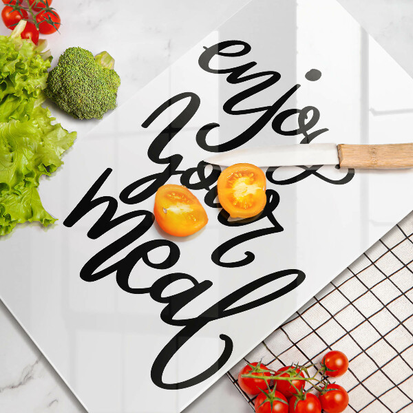 Tábua de corte de vidro A inscrição Aproveite sua refeição