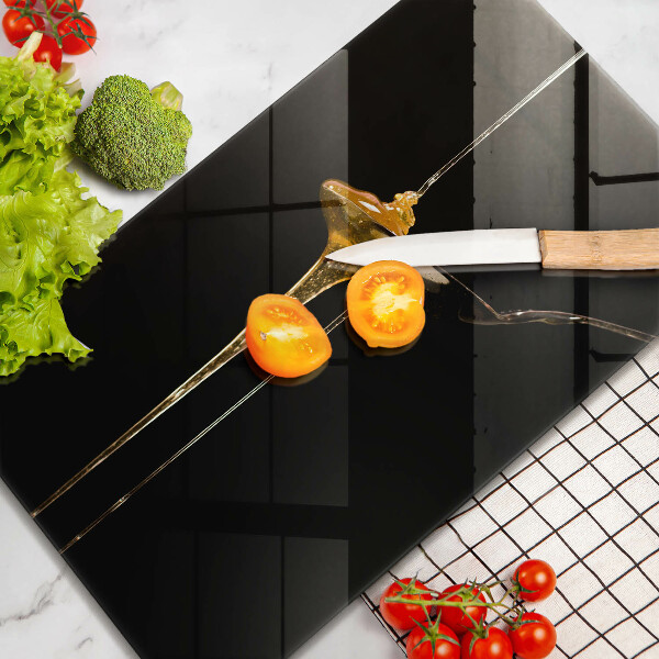 Tábua de cortar de vidro Uma colher de chá de mel