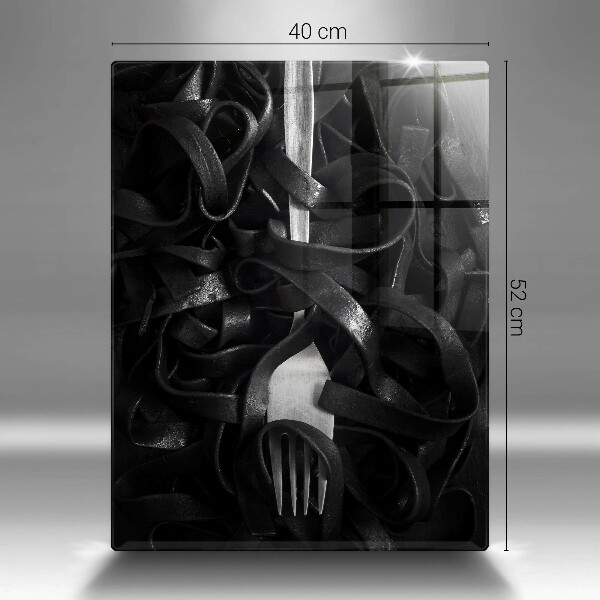 Tábua de corte Macarrão preto e um garfo