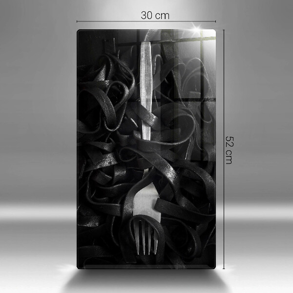 Tábua de corte Macarrão preto e um garfo