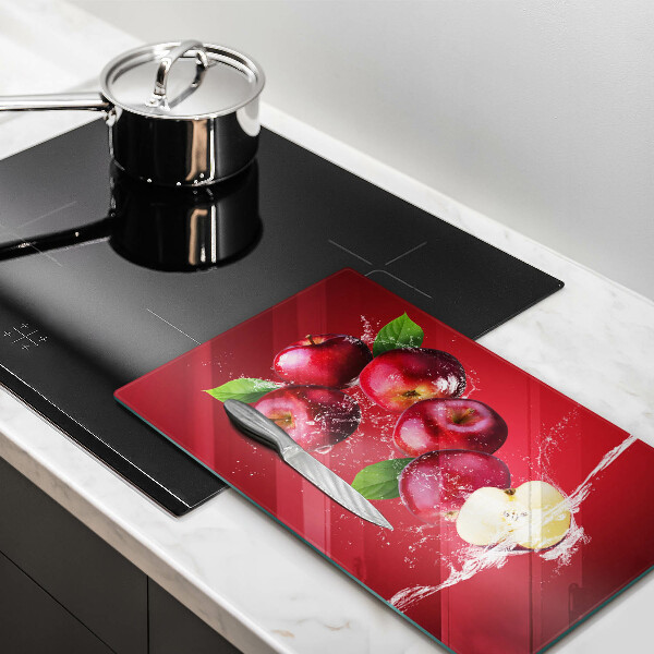 Tábua de cortar alimentos Maçãs suculentas na água