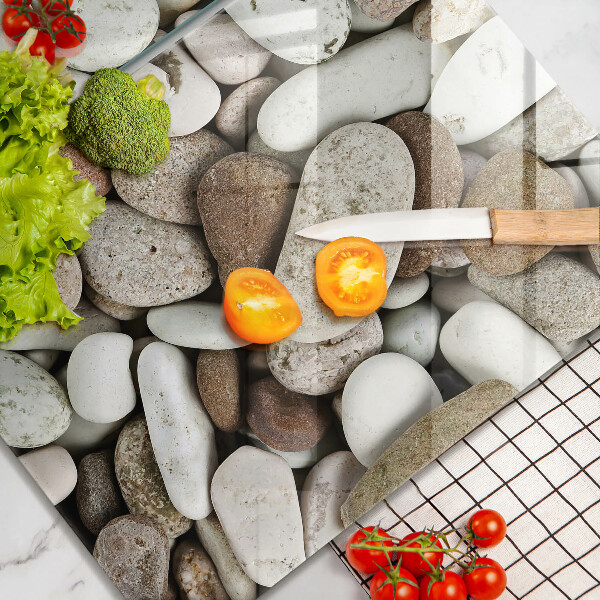 Tábua de corte de vidro Fundo de pequenas pedras