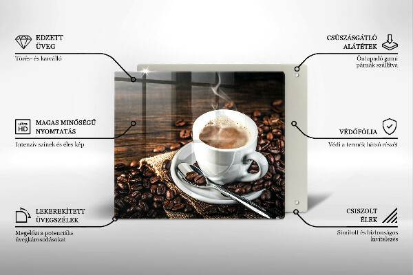 Tábua de cortar Uma xícara e grãos de café