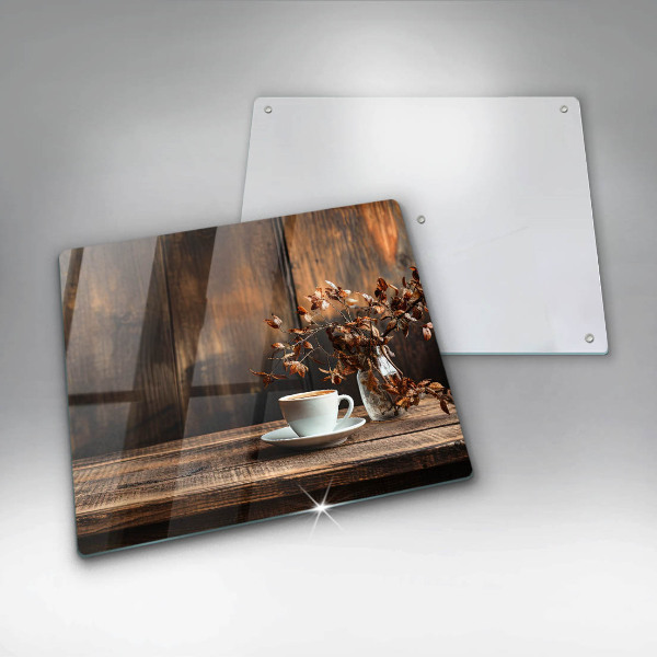 Tábua de corte Uma xícara de café e madeira