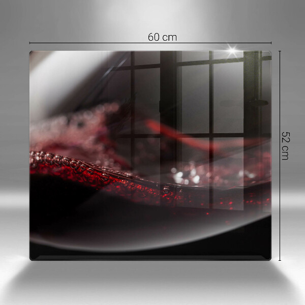 Tábua de corte de vidro Um copo de vinho tinto