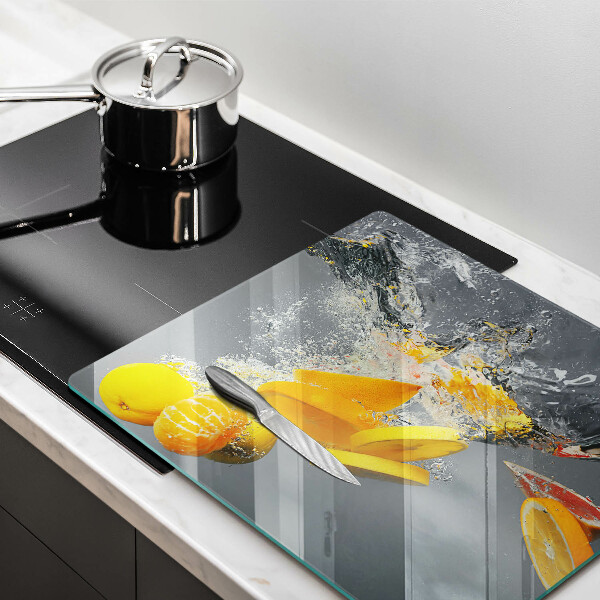 Tábua de cortar de vidro Limões em água