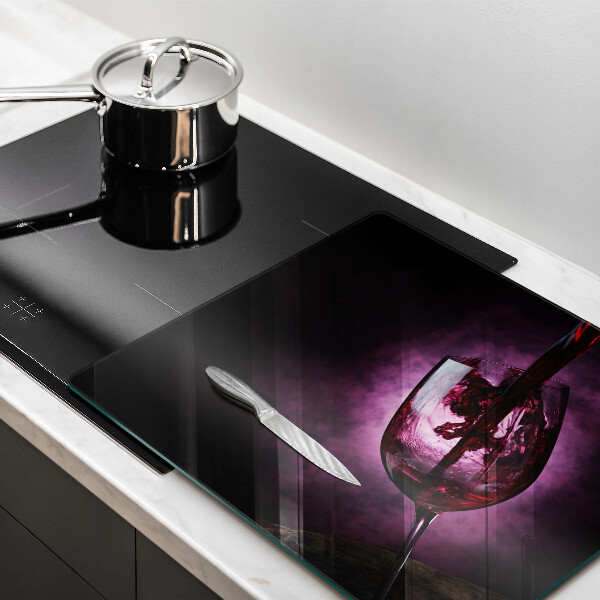 Tábua de corte de vidro Um copo de vinho