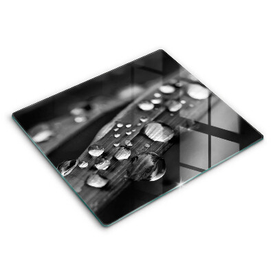 Tábua de cortar de vidro Gotas de orvalho nas folhas