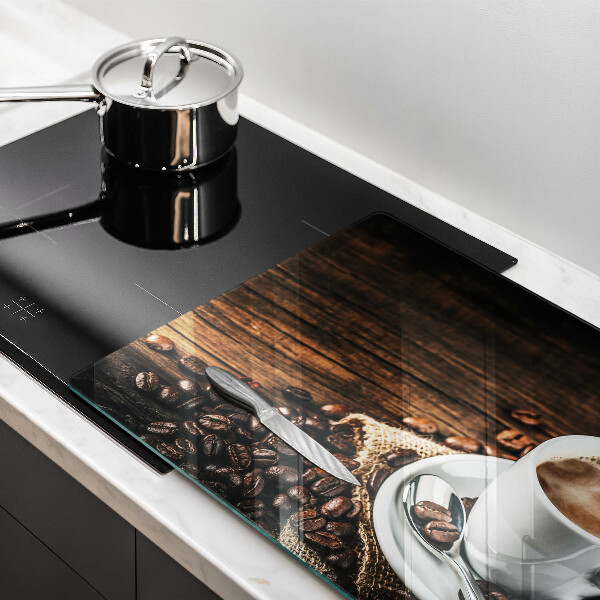 Tábua para cozinha Uma xícara e grãos de café