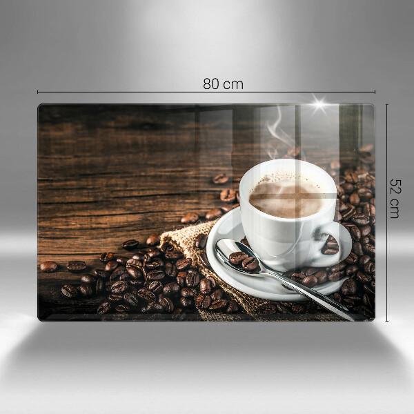 Tábua para cozinha Uma xícara e grãos de café