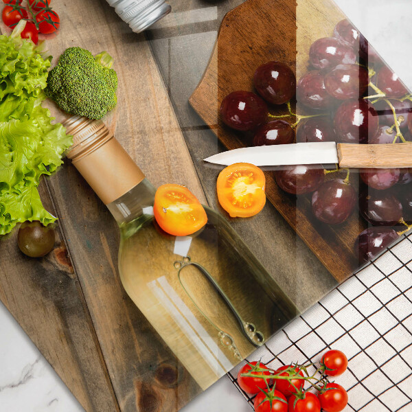 Tábua de corte Garrafas de vinho e uvas