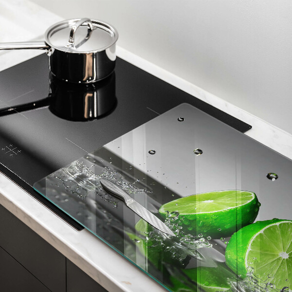 Tábua de cortar alimentos Limões suculentos e água