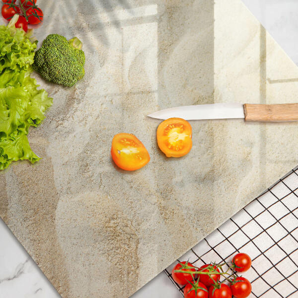 Tábua para corte Folhas de palmeira e areia