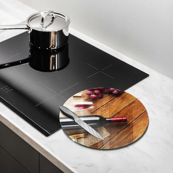 Tábua de cortar alimentos Uma garrafa de vinho tinto