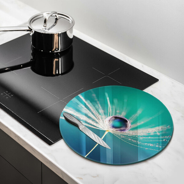 Tábua de cortar alimentos Orvalho em um dente-de-leão