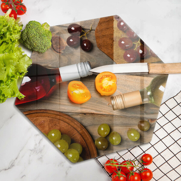 Tábua corte Garrafas de vinho e uvas