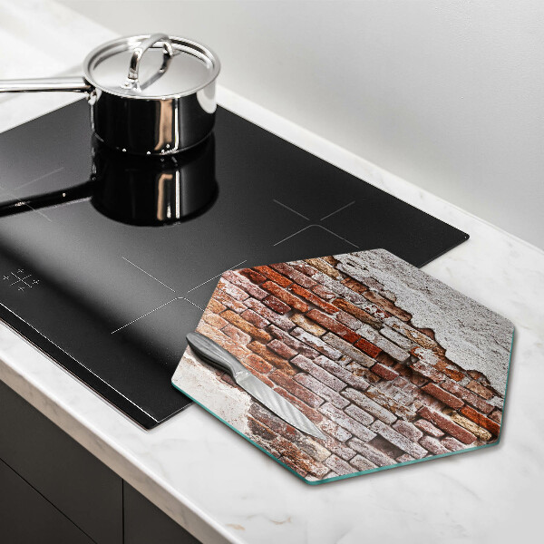 Tábua de corte Parede velha de tijolos e concreto