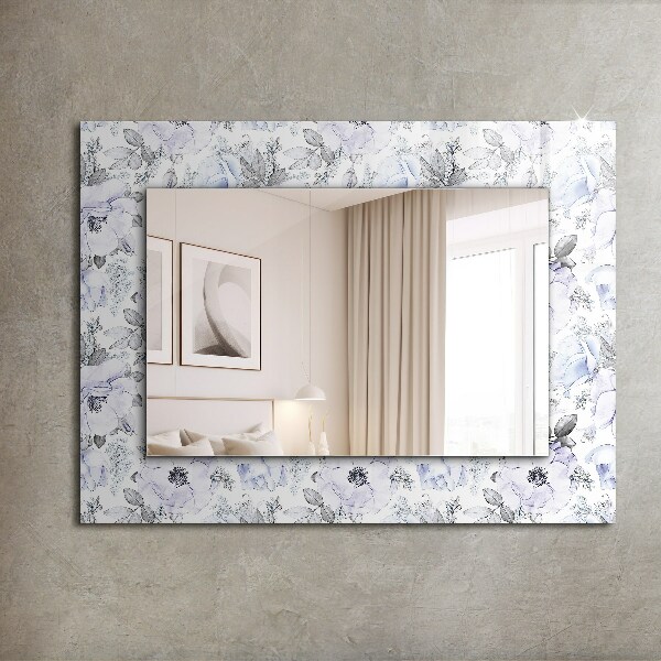 Espelho com moldura decorada com flores e folhas