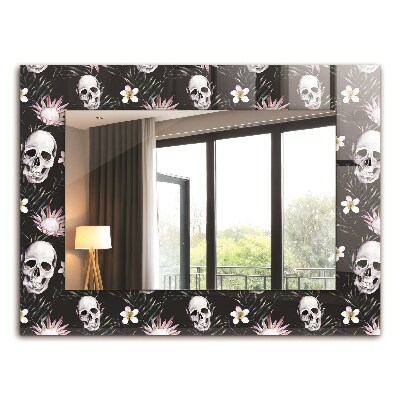 Espelho com moldura decorada de crânios e flores