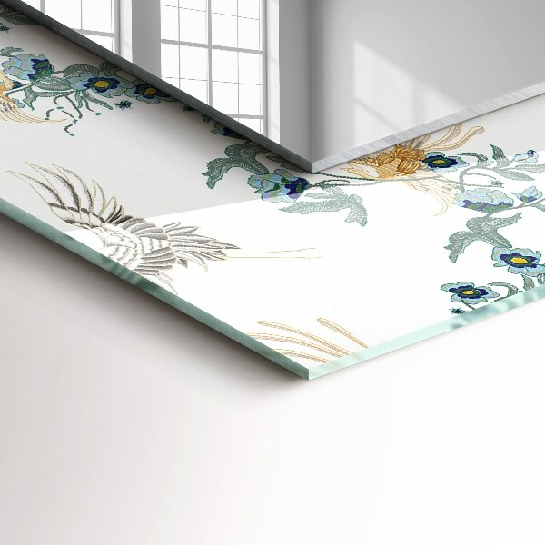 Espelho com moldura decorada com pássaros e flores