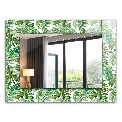 Espelho com moldura decorada com folhas verdes tropicais
