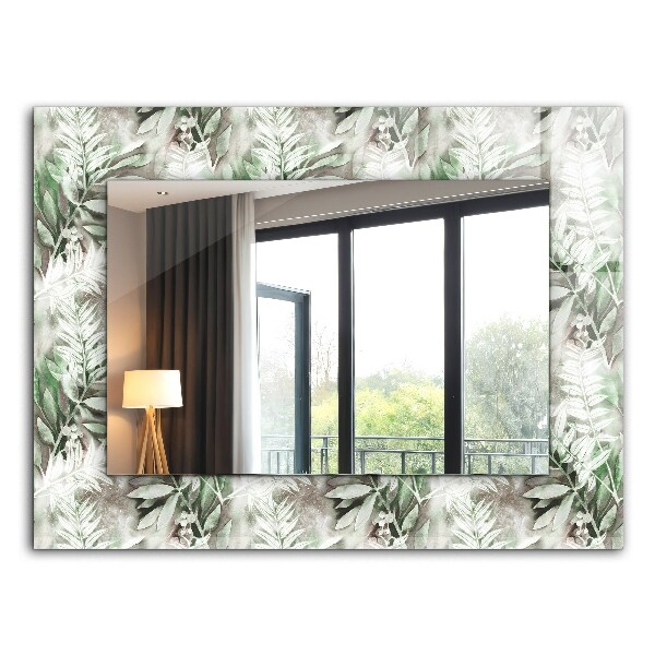 Espelho decorativo com desenho de folhas verdes