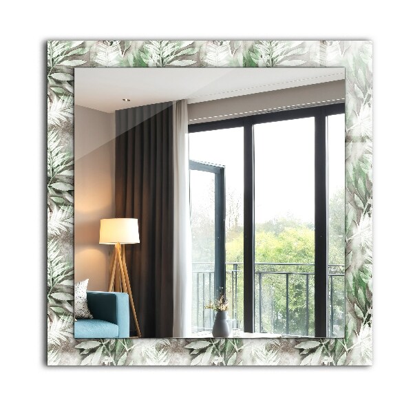 Espelho decorativo com desenho de folhas verdes