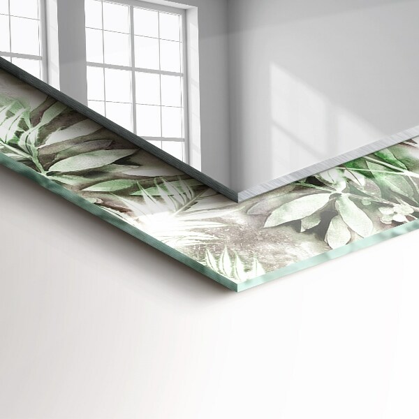 Espelho decorativo com desenho de folhas verdes