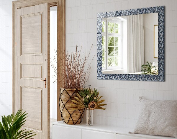Espelho com moldura decorada com desenho de flor azul