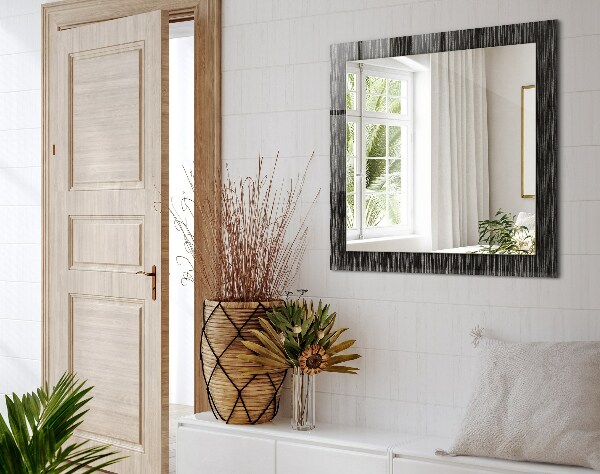 Espelho com moldura decorada de linhas modernas