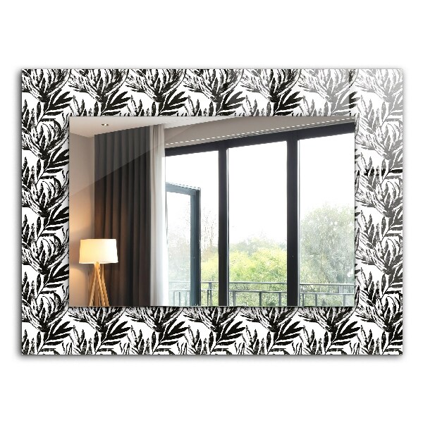 Espelho decorativo com estampa de folhas pretas e brancas
