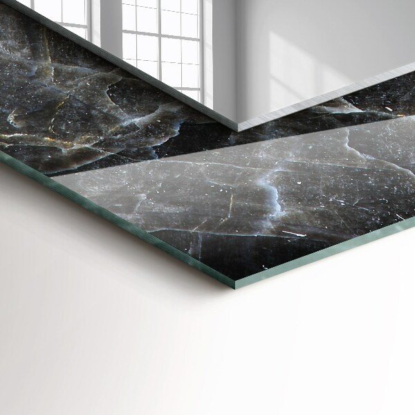Espelho com moldura decorada em veios de mármore preto