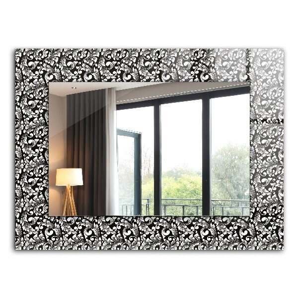 Espelho decorativo com ornamentos em preto e branco