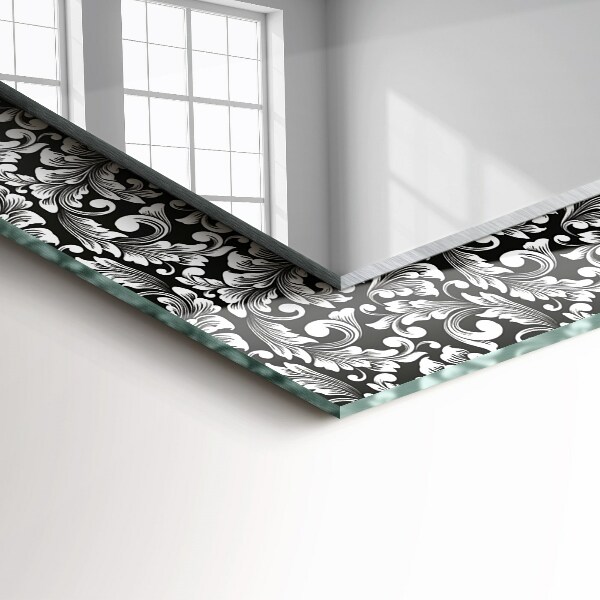 Espelho decorativo com ornamentos em preto e branco