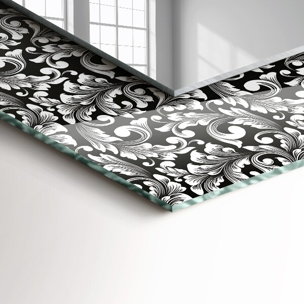 Espelho decorativo com ornamentos em preto e branco