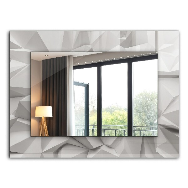 Espelho com moldura decorada de formas geométricas abstratas