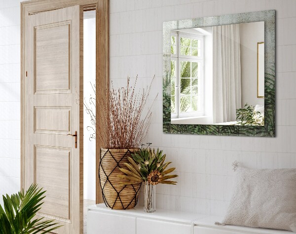 Espelho com moldura decorada com folhas de samambaia na cor verde