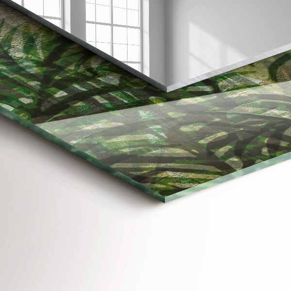 Espelho com moldura decorada com folhas de samambaia na cor verde