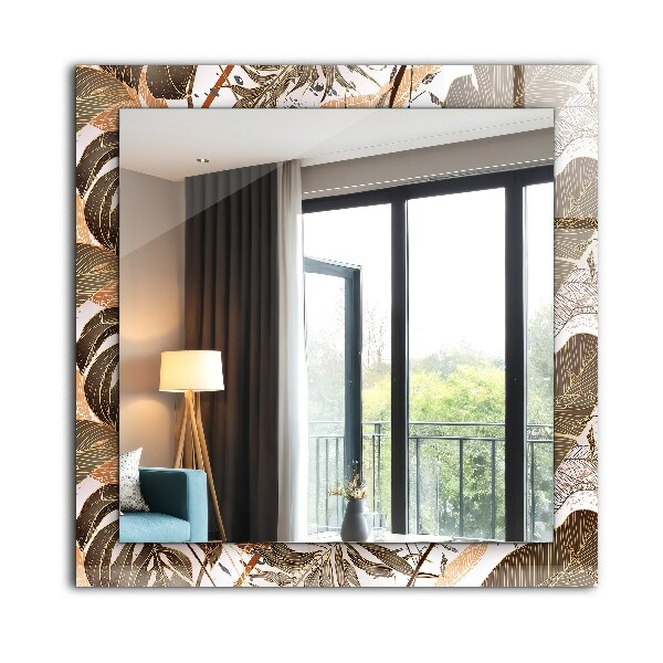 Espelho com moldura decorada com motivos de folhas tropicais