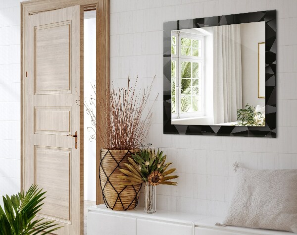 Espelho com moldura decorada com formas geométricas pretas