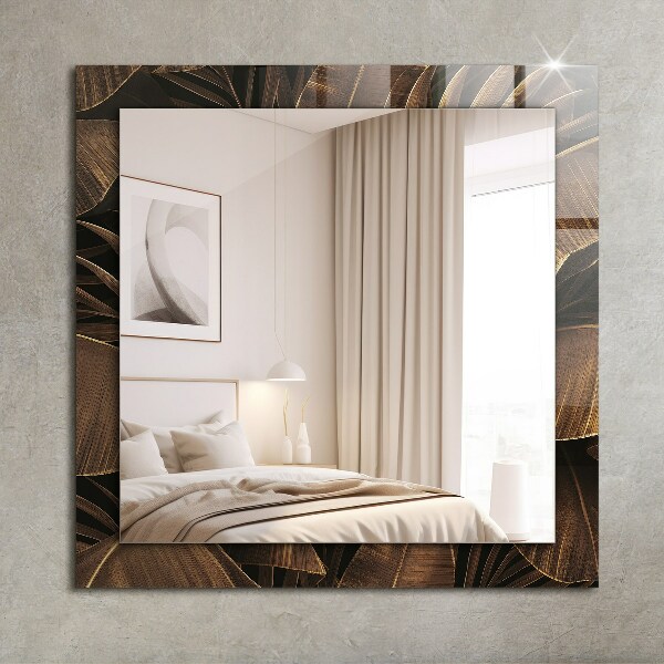 Espelho com moldura decorada com folhas tropicais