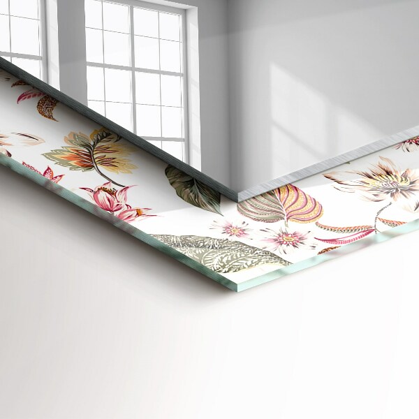 Espelho com moldura decorada com flores e folhas