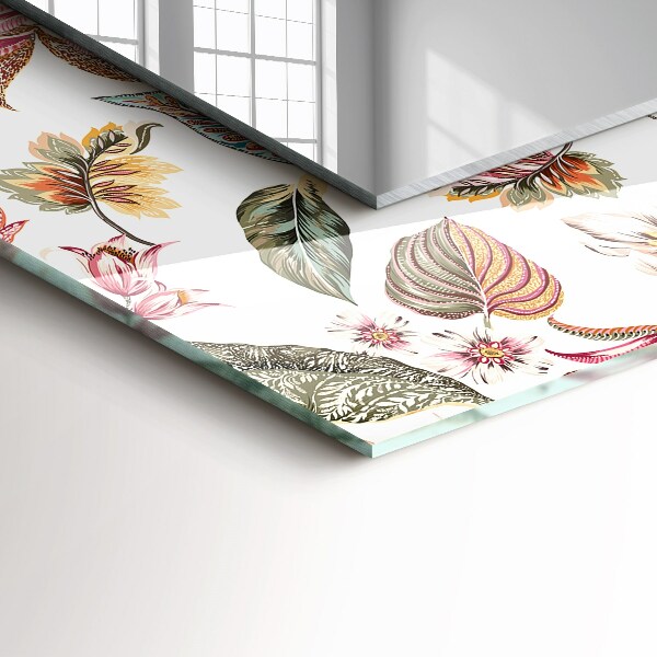 Espelho com moldura decorada com flores e folhas