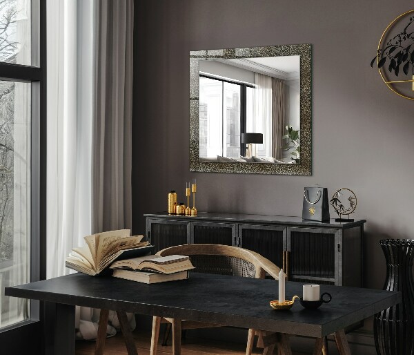 Espelho decorativo com motivo em dourado