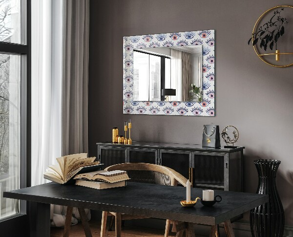 Espelho com moldura decorada com motivo de olho