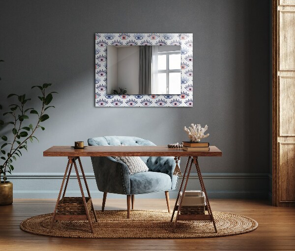 Espelho com moldura decorada com motivo de olho