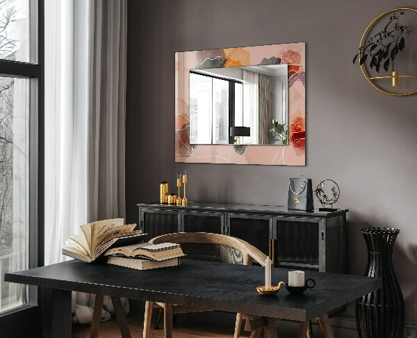 Espelho com moldura decorada com motivos florais abstratos