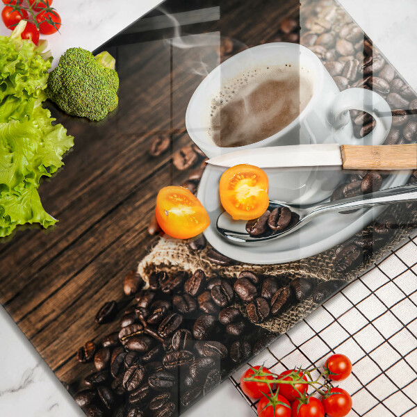 Cobertura de indução Uma xícara e grãos de café