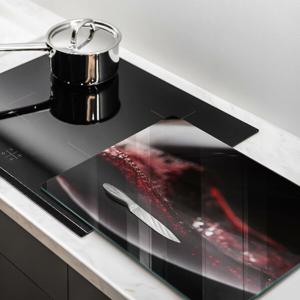 Cobertura de indução Um copo de vinho tinto